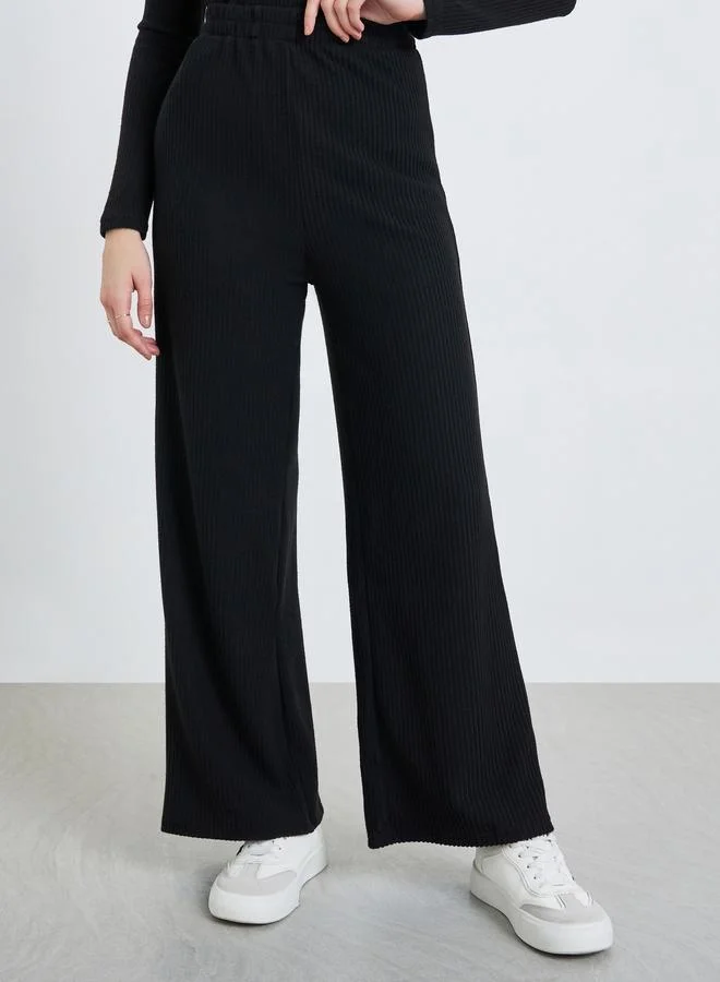 Styli Women Black Ribbed Knit Wide Leg Trousers